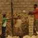 Iraqis rebuild market brick by brick