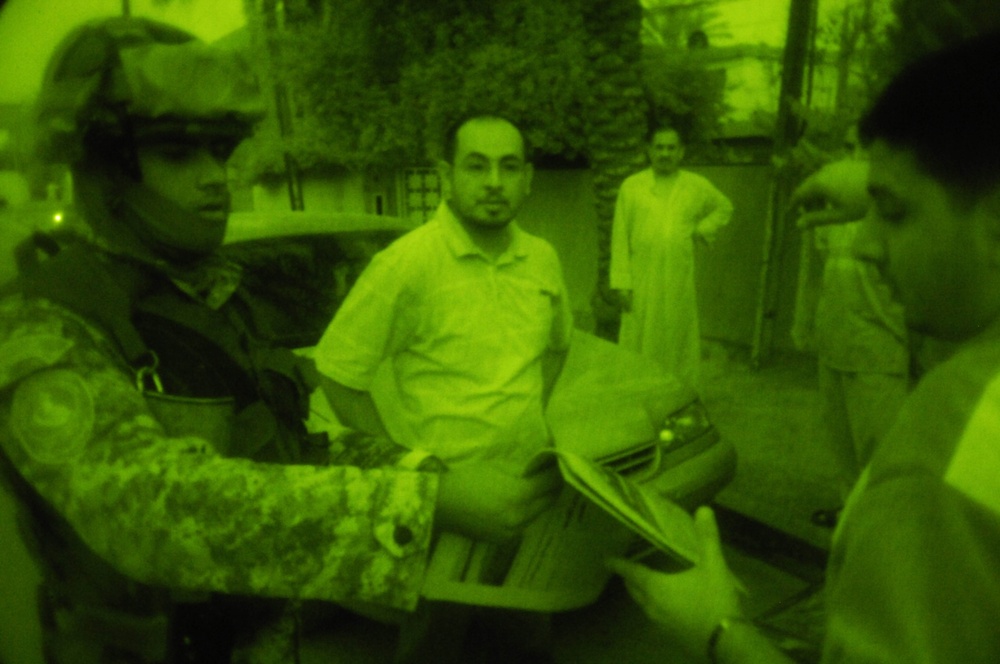 U.S. Soldiers and Iraqi security forces patrol together