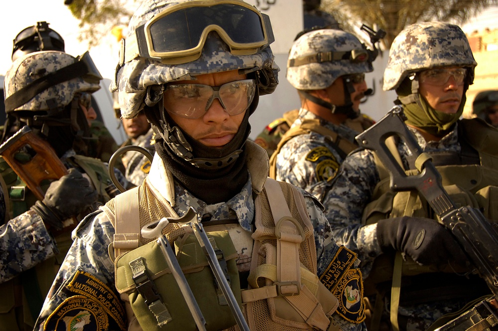 Iraqi National Police Stand Guard in Sadr City