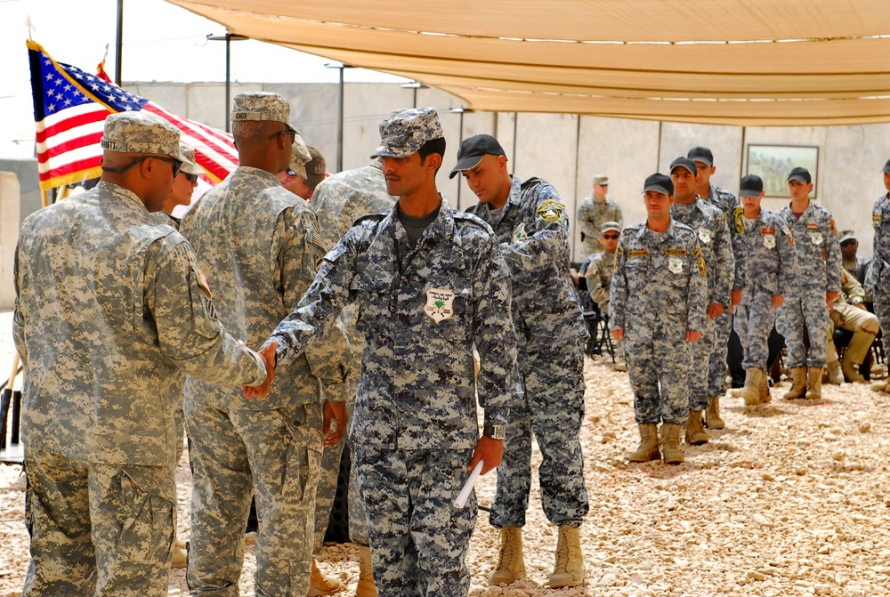 Iraqi security forces class graduates from non-commissioned officers academy