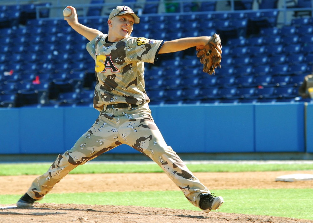 Sailor pitches ball during annual miilitary all-star game