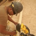 Seabees construct huts in Al Anbar province
