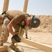 Seabees construct huts in Al Anbar province