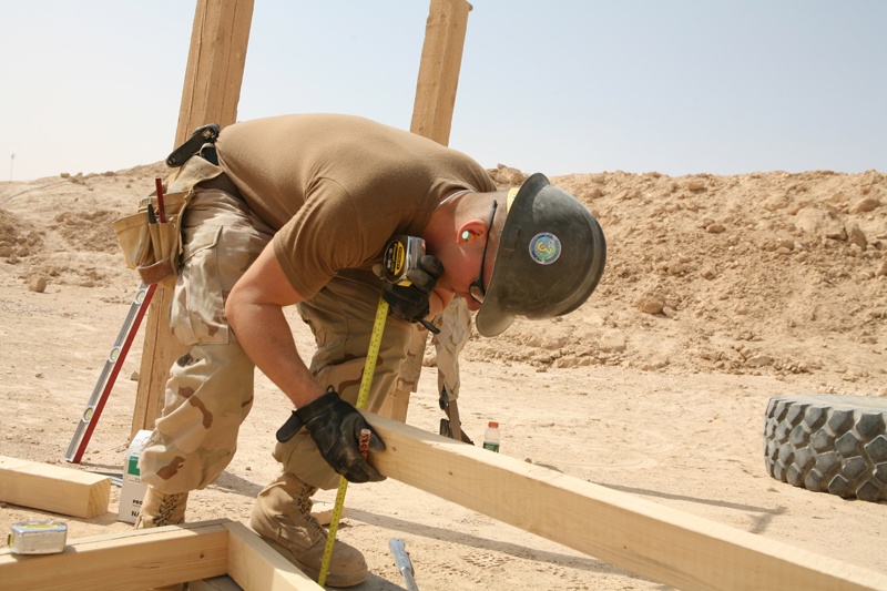 Seabees construct huts in Al Anbar province