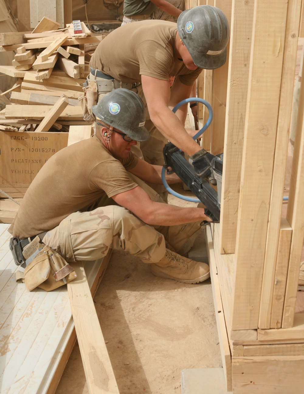 Seabees construct huts in Al Anbar province