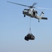 Transferring cargo through vertical replenishment