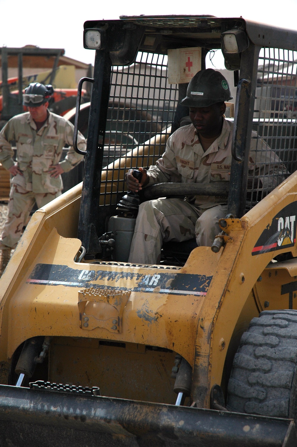 Seabees construct huts in Iraq