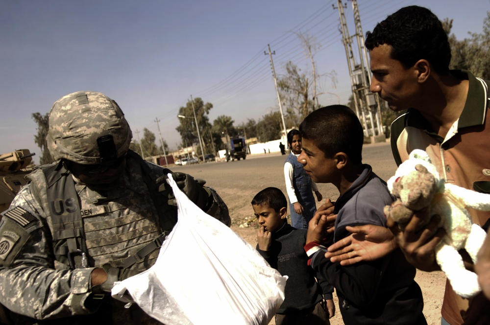 4th ID Soldiers patrol, talk with local farmers