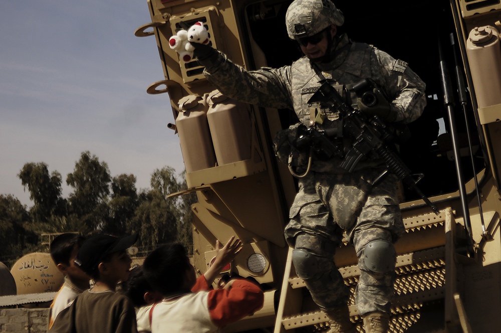 4th ID Soldiers patrol, talk with local farmers