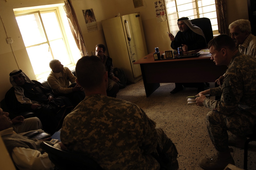 4th ID Soldiers patrol, talk with local farmers