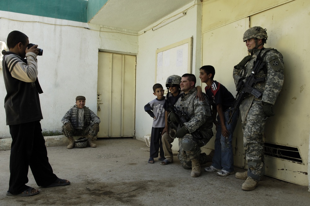 4th ID Soldiers patrol, talk with local farmers