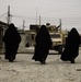 Soldiers mingle with Kirkuk locals during patrol