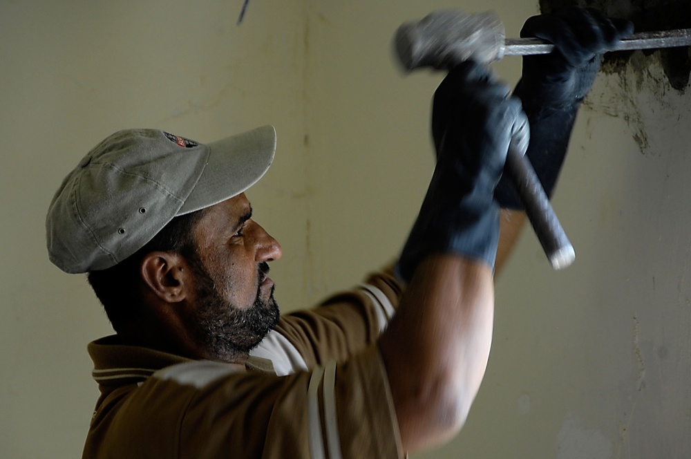 Iraqi Construction Worker Works on Mosque