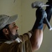 Iraqi Construction Worker Works on Mosque