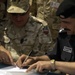 Polish Commander Hands Over Keys to 300 New Iraqi Police Vehicles