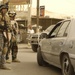 U.S. Iraqi national police, army, patrol streets, look for caches