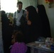 Iraqi Army, Coalition Troops Provide Medical Care at School