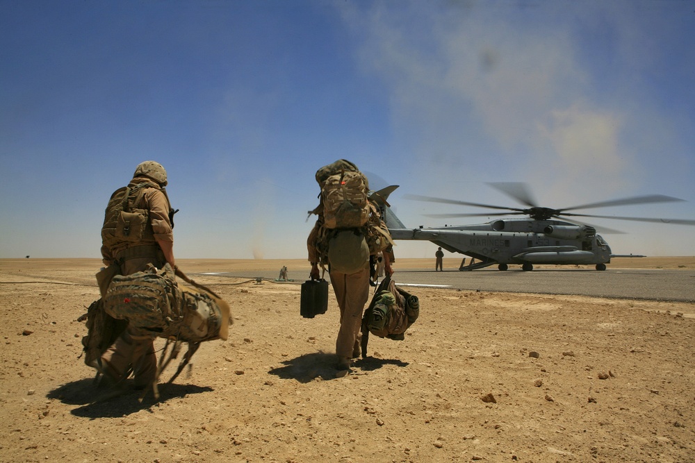 U.S. Marines Board Sea Stallion Helicopter