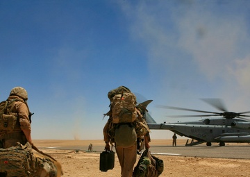U.S. Marines Board Sea Stallion Helicopter