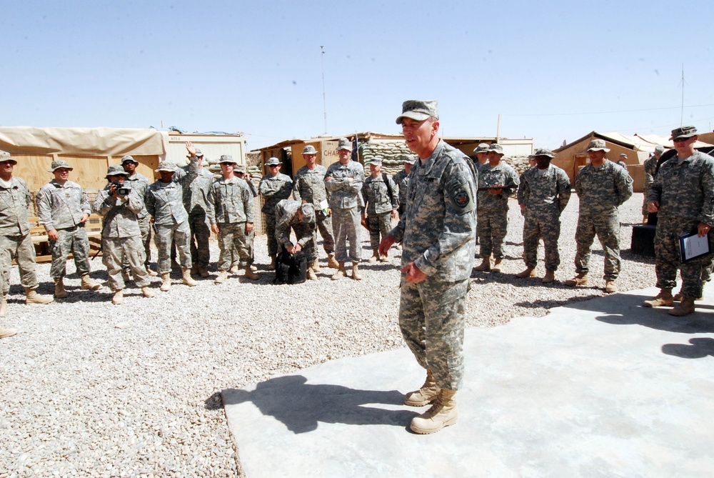 Gen. Petraeus takes a stroll through Hawijah during Army's 233rd Birthday