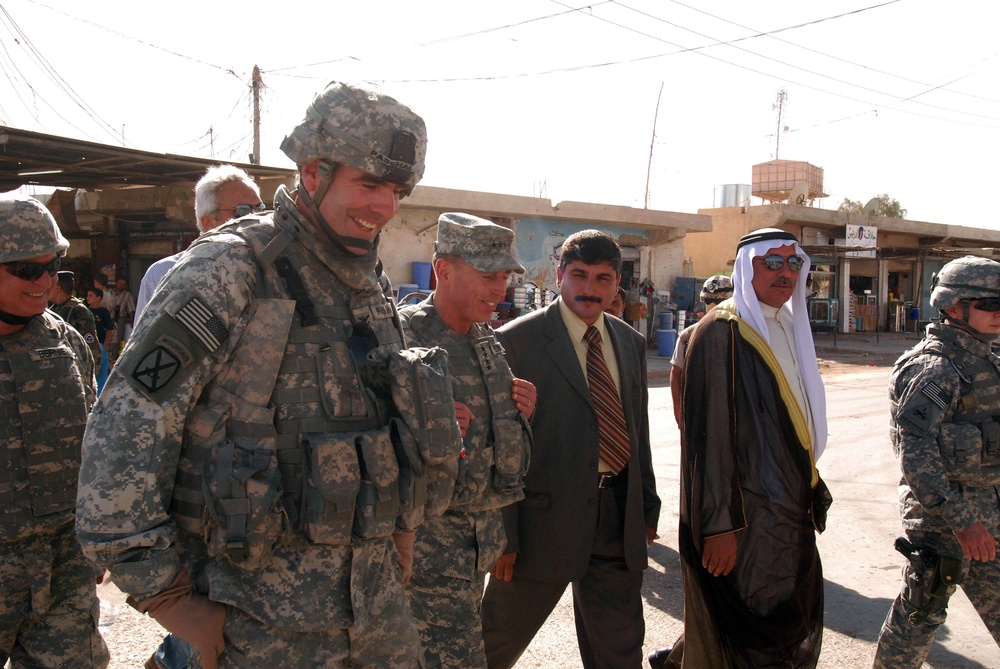 Gen. Petraeus takes a stroll through Hawijah during Army's 233rd Birthday