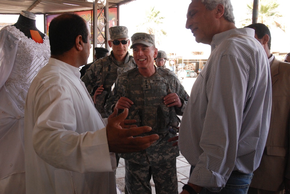 Gen. Petraeus takes a stroll through Hawijah during Army's 233rd Birthday