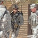 Gen. Petraeus takes a stroll through Hawijah during Army's 233rd Birthday