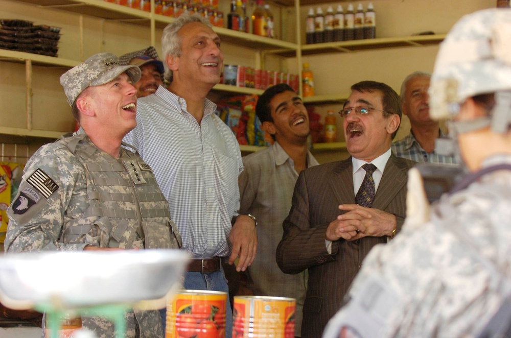 Gen. Petraeus takes a stroll through Hawijah during Army's 233rd Birthday