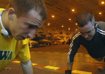 Working out aboard USS Harry S. Truman