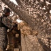 Iraqi Policeman Watches Over the Roadways