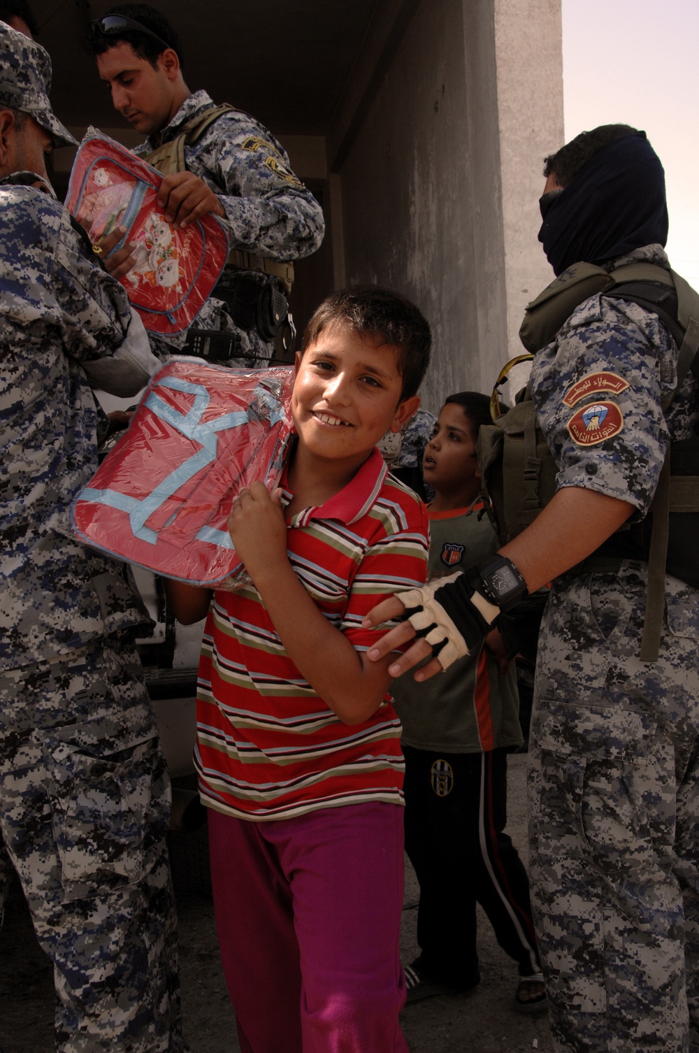 Iraqi Children Receive School Supplies From Iraqi Police