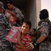 Iraqi Children Receive School Supplies From Iraqi Police