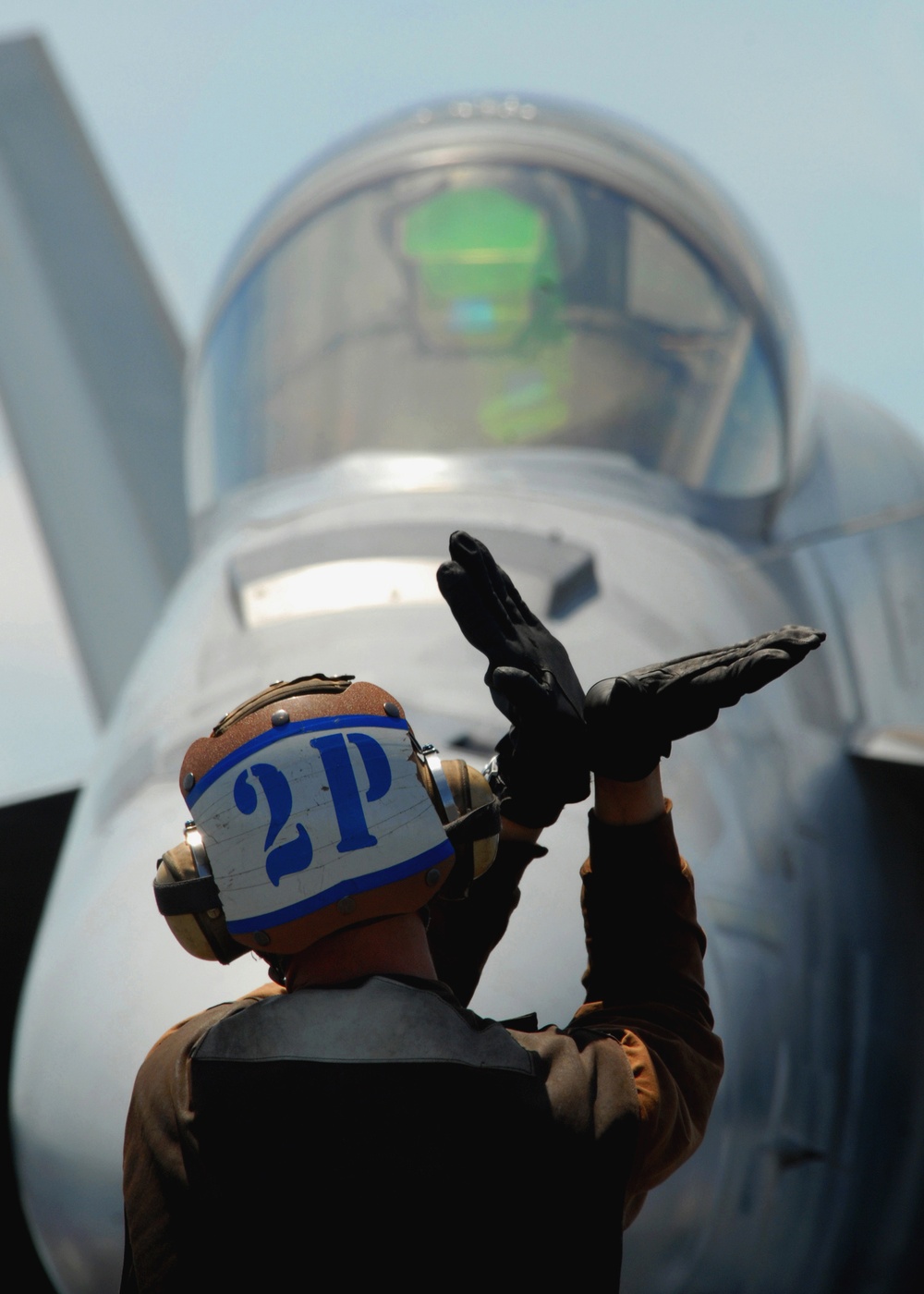 USS Abraham Lincoln Sailors manage flight deck