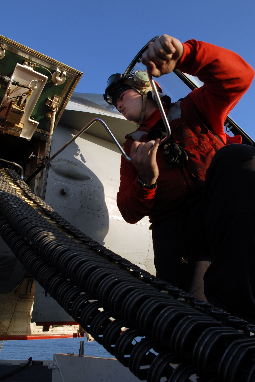 USS Abraham Lincoln Sailors manage flight deck