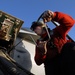 USS Abraham Lincoln Sailors manage flight deck