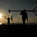 USS Abraham Lincoln Sailors manage flight deck