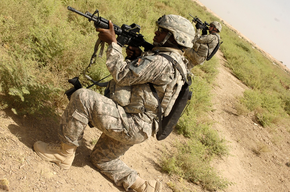 U.S. Army Combat Camera Member Helps Provide Security