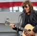 Sailor enjoy Billy Ray Cyrus performance aboard USS Iwo Jima