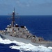 USS Niagara Falls steams along, receives supplies
