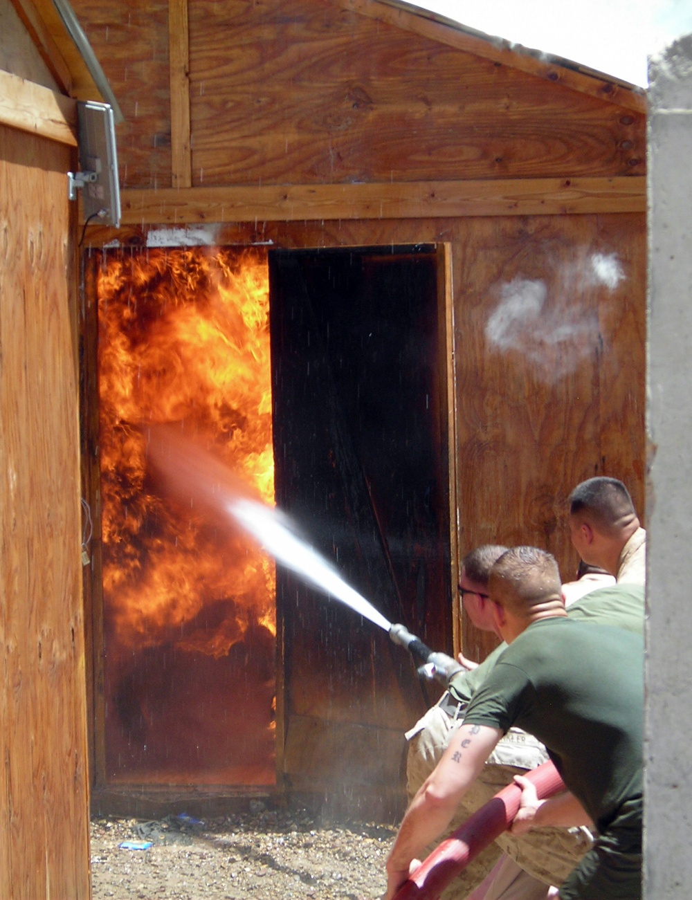 Fire destroys post, Marines persevere