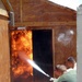 Fire destroys post, Marines persevere