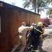Fire destroys post, Marines persevere