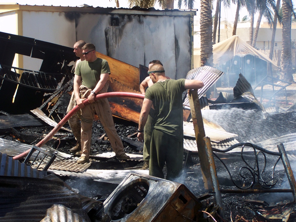 Fire destroys post, Marines persevere