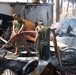 Fire destroys post, Marines persevere