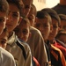 Iraqi Children Wait in Line to Receive Free Book Bags