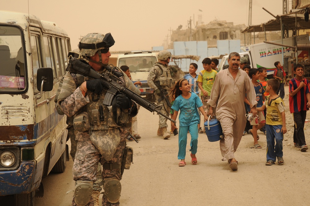 Civil Affairs Conduct Foot Patrol in Sadr City During Task Force Gold
