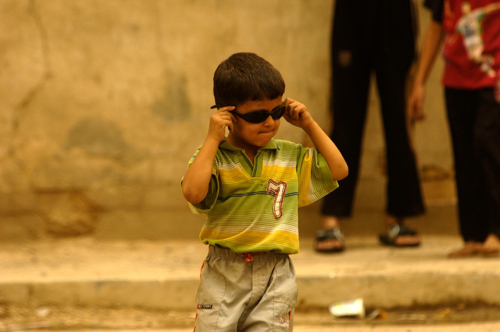 Civil Affairs Conduct Foot Patrol in Sadr City During Task Force Gold
