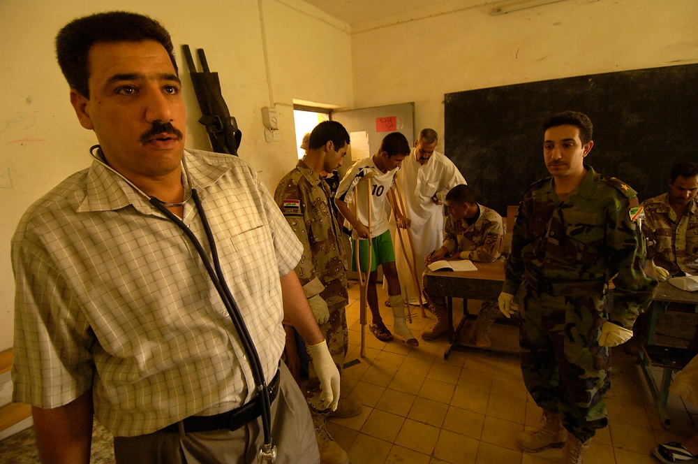 Iraqi Civilians Receive Medical Attention by Iraqi Army