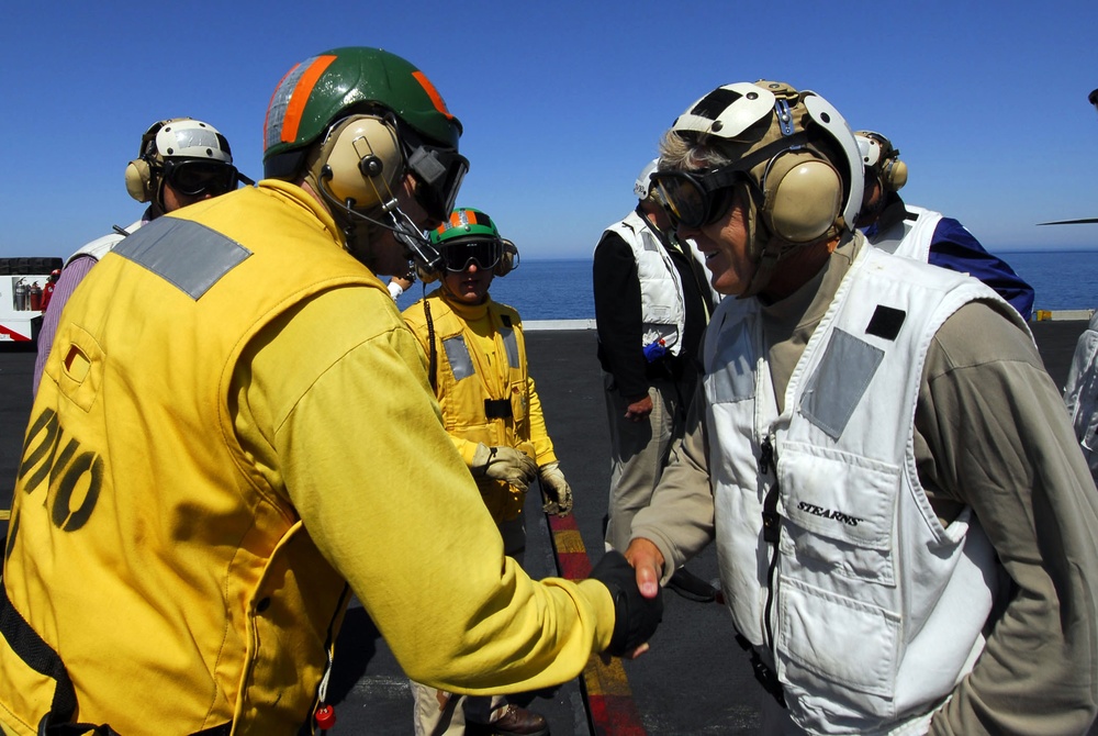 USC football coach, Pete Carroll visit Sailors