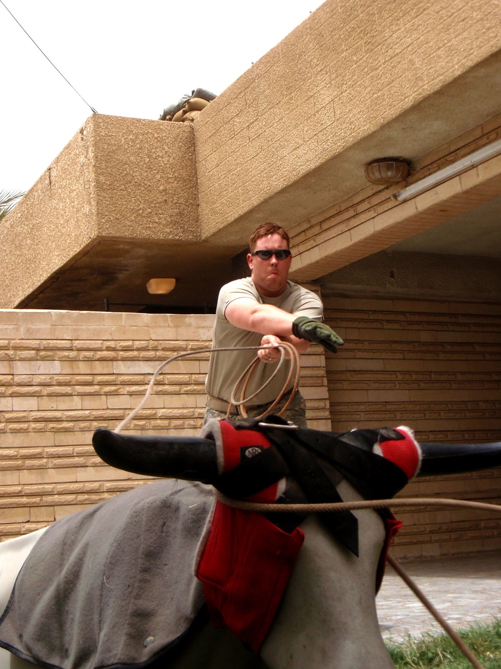 Cowboy/Soldier hones roping skills while on deployment in Baghdad